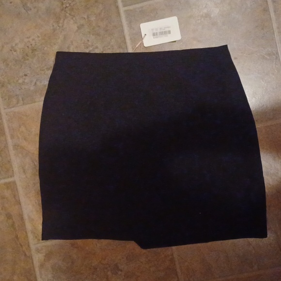 A black skirt with rhinestone fringe. - Picture 3 of 3